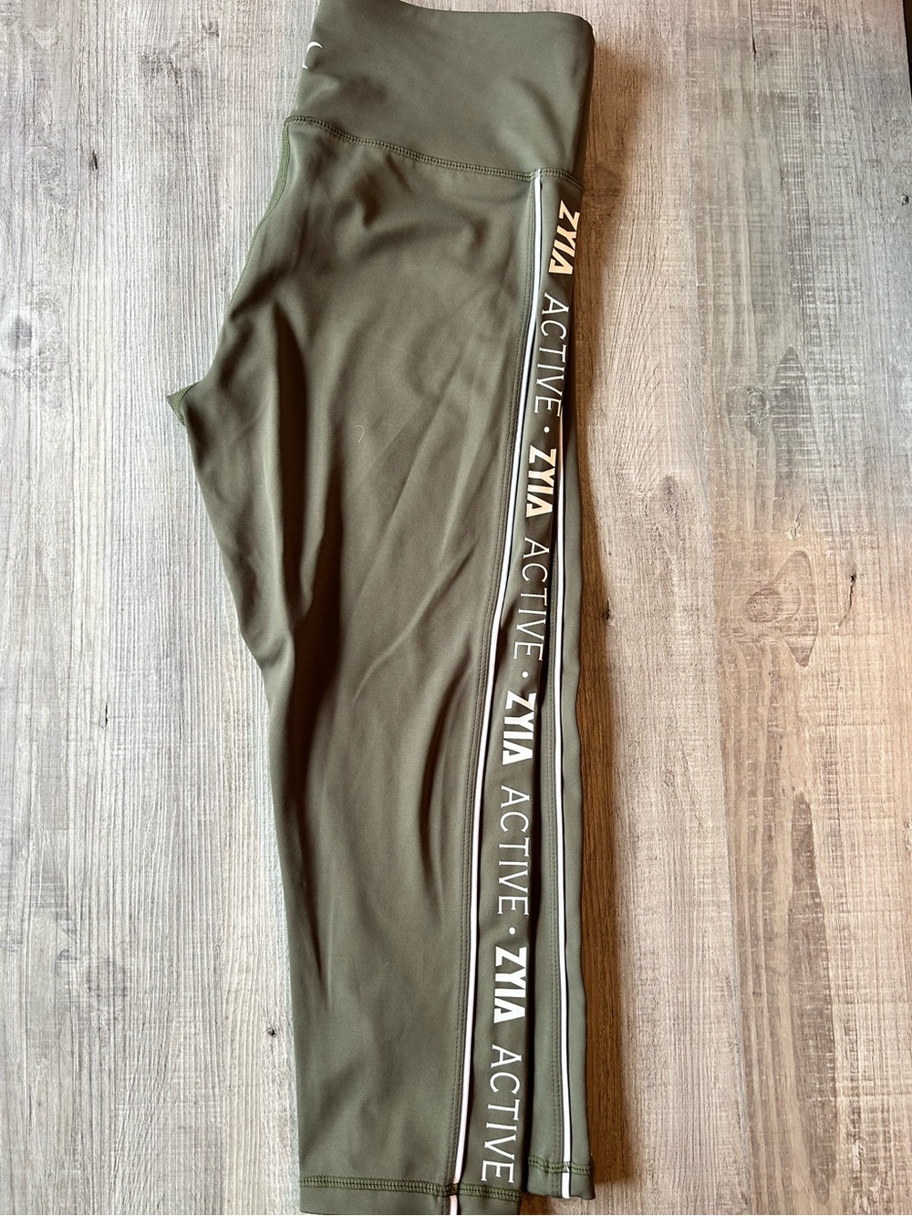 ZYIA Active Women's Olive Cropped Leggings with Side Logo Tape • 8/10